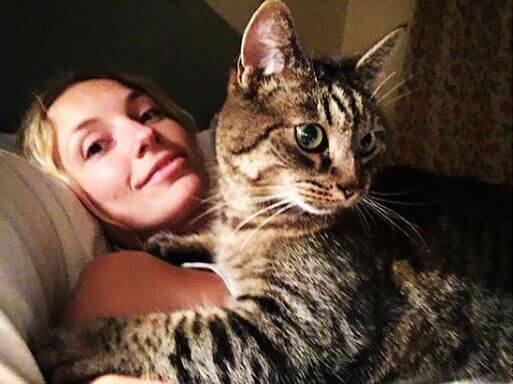 Perdita Weeks with her cat.